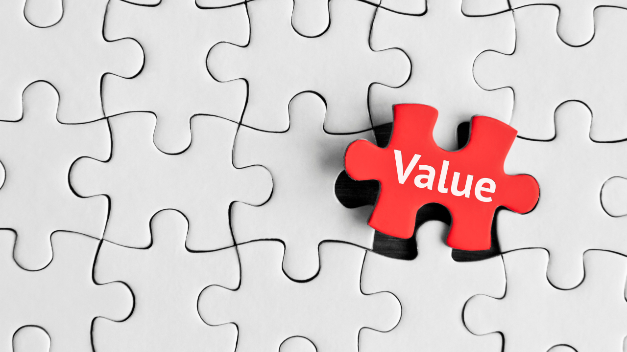 A visual representation of a white puzzle with a single red puzzle piece labeled "value," symbolizing the importance of values in an one's life.